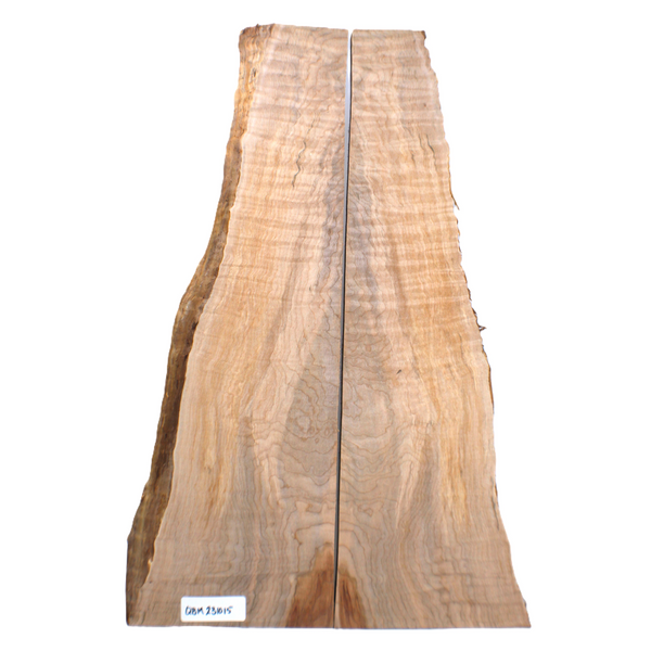 Interesting flat-sawn flame to quilted maple two-piece set with 4A grade curl/quilt throughout, beautiful blue color variation and live edge.  One piece is heavily two-toned on one side.