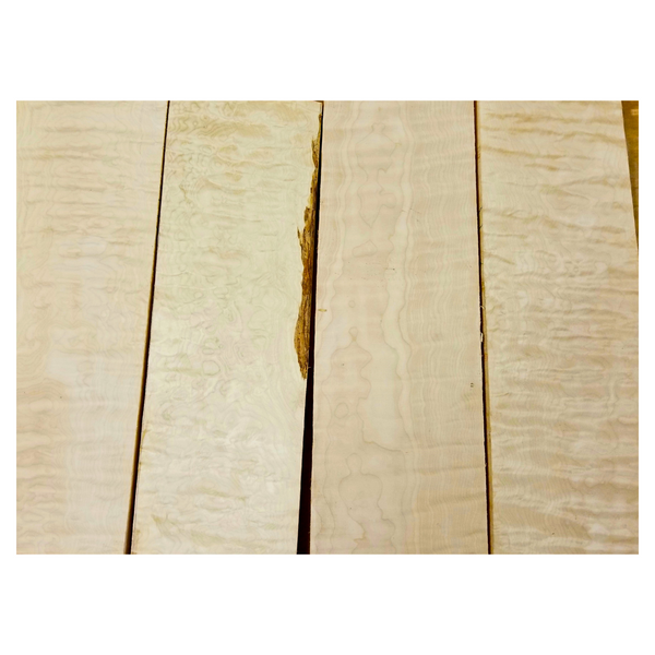 Four quilted maple billets with varying figure pattern and colors.