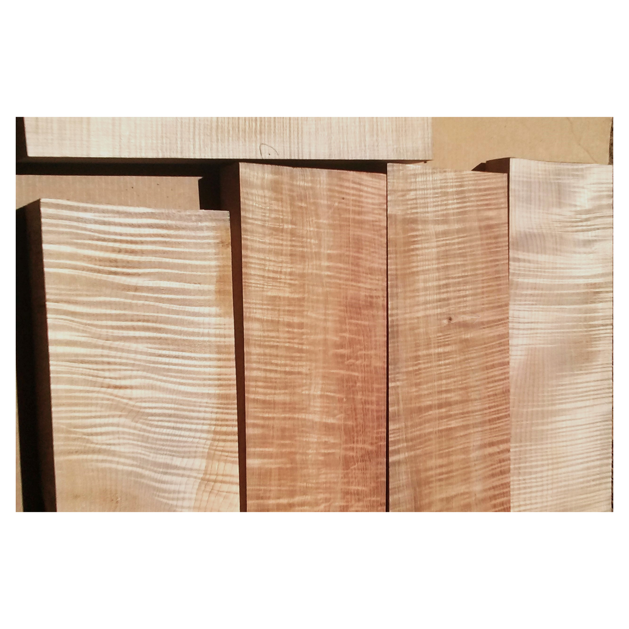 Example of several flame (curly) maple billets in multiple colors and figure patterns.