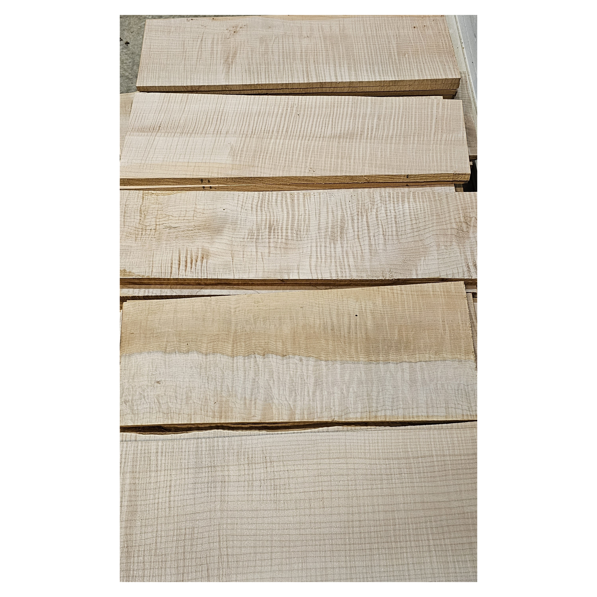 Selection of flame maple craft sets in varying colors and curl grade.
