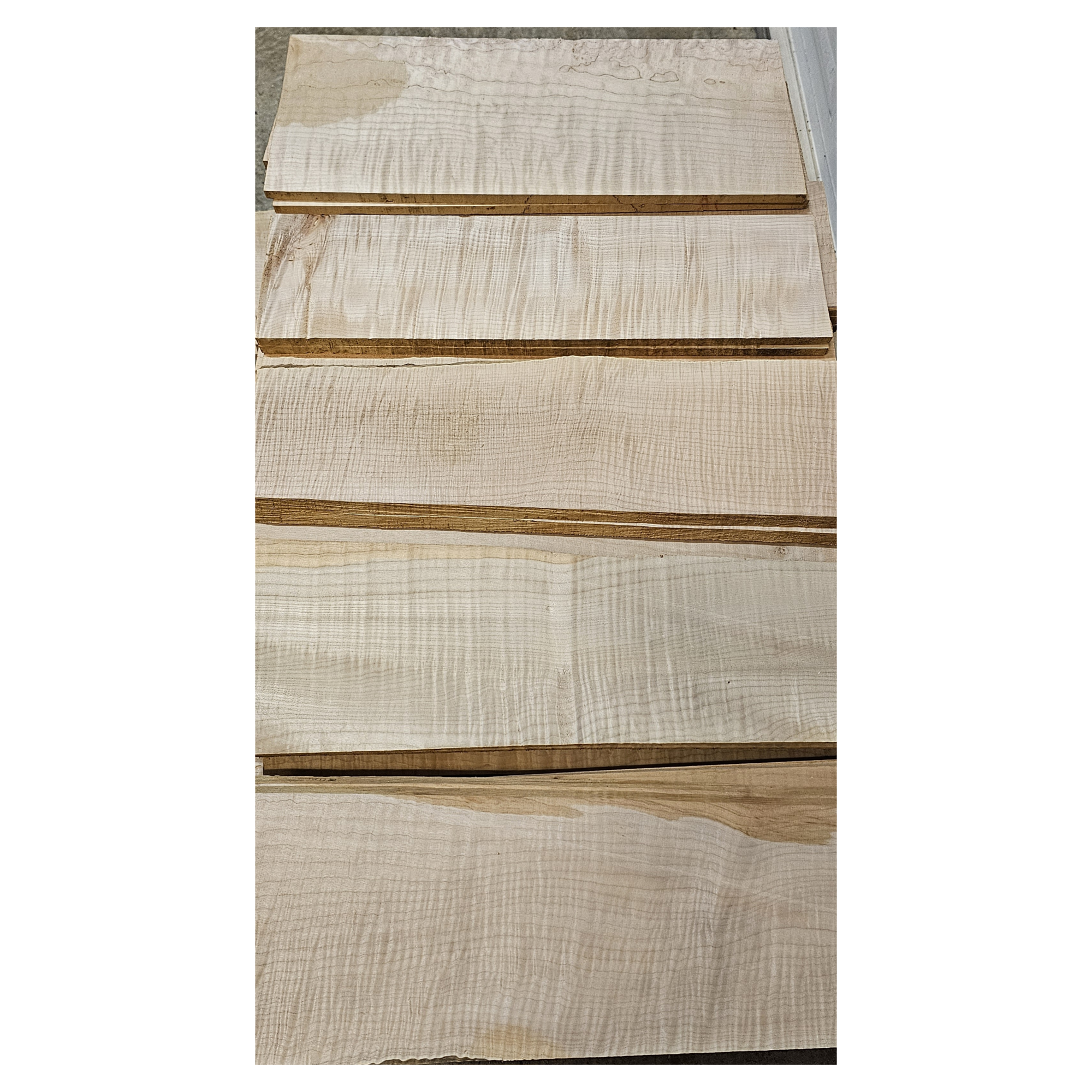 Selection of flame maple craft sets in varying colors and curl grade.