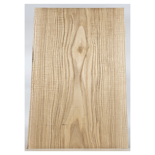 Large French ash billet/small slab. 5A well-quartered curl throughout, heavy grain lines and fairly uniform light color.
