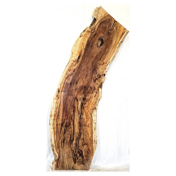 Amazing curly koa slab with beautiful color, interesting voids, light to heavy curl, and a gorgeous live edge.