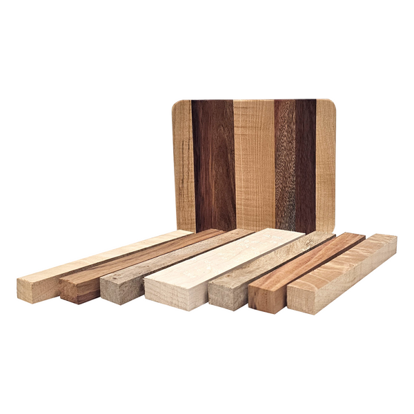 Set of wooden cutting boards and planks on a white background