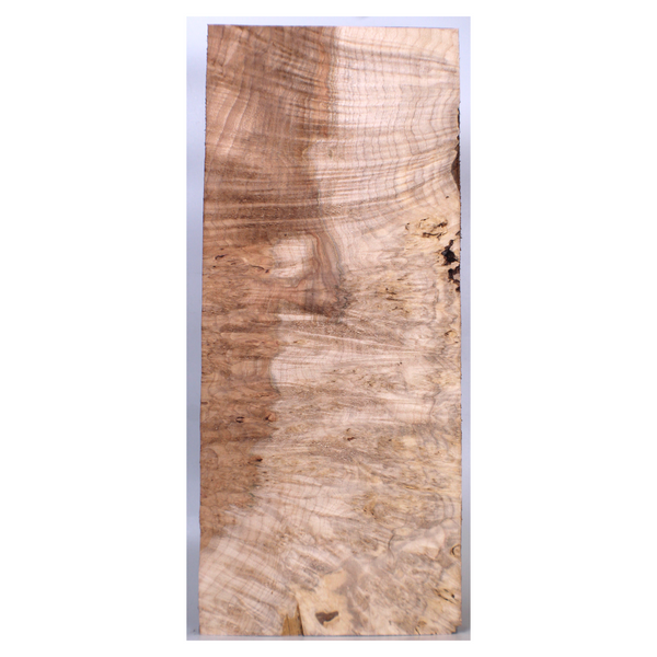 Beautiful waterfall maple burl billet with two-tone color, eyes and rays and small bark inclusions.