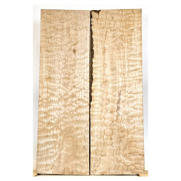 Beautiful quilted maple book-matched set with amazing 5A grade figure, interesting color streaks and bird pecks.