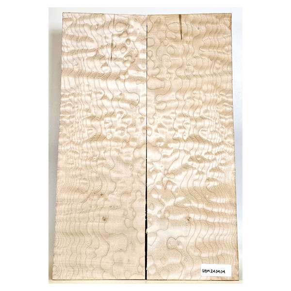 Quilted maple 2-piece set with 4A grade quilting throughout, tiny burls scattered and a light green streak.