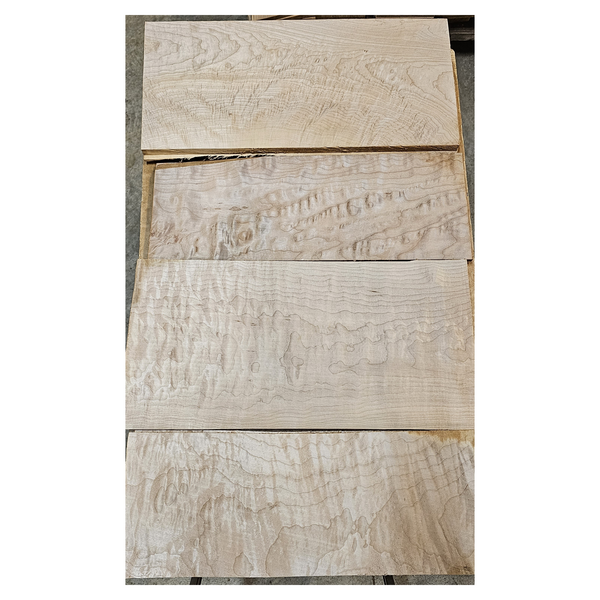 Selection of quilted maple sets with varying color and figure grade.