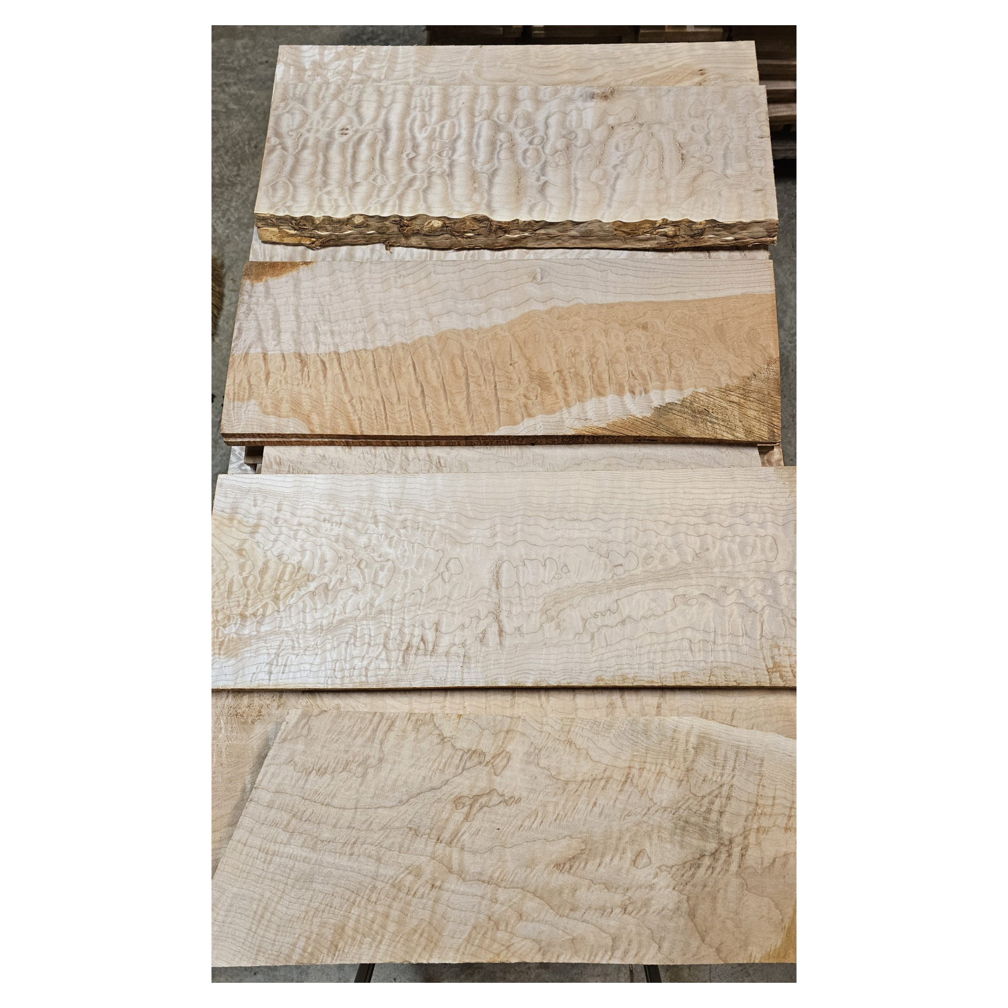 Selection of quilted maple sets with varying color and figure grade