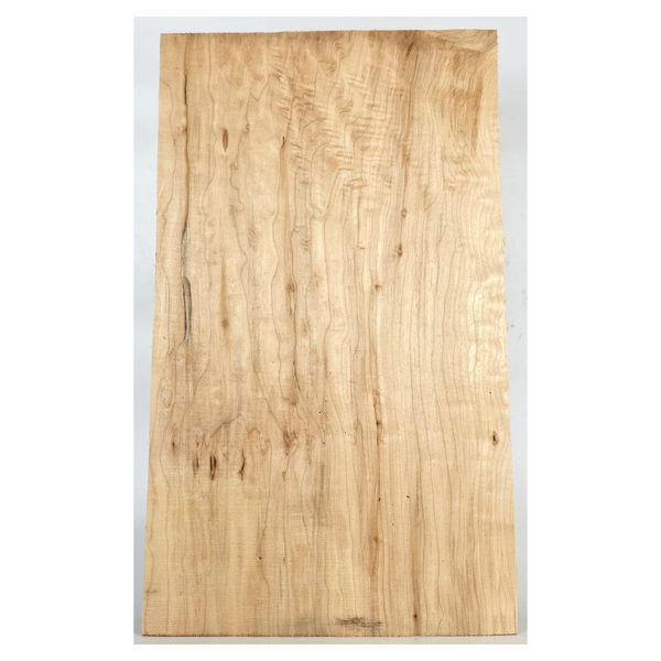 Lightly quilted maple craft board with beautiful color variation and dark streaks.