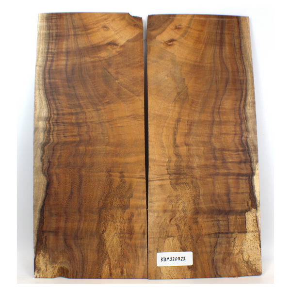 2 piece, 4A grade, slightly off quarter curly koa set.  This set has nice color and wide, ropy figure.  There is some spot rot present, but it is solid.  This set has been sanded to 400 grit.  Dimensions: Thickness (each piece): .25", Width: 8.25", Length: 20".