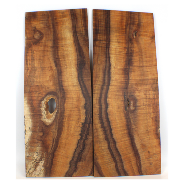 Absolutely stunning 2-piece curly koa set with intense 5A curl, amazing color and grain, sap lines and voids.  This set is sanded to 400 grit.  Dimensions: Thickness (each piece): .25", Width: 7.75", Length: 20.25.