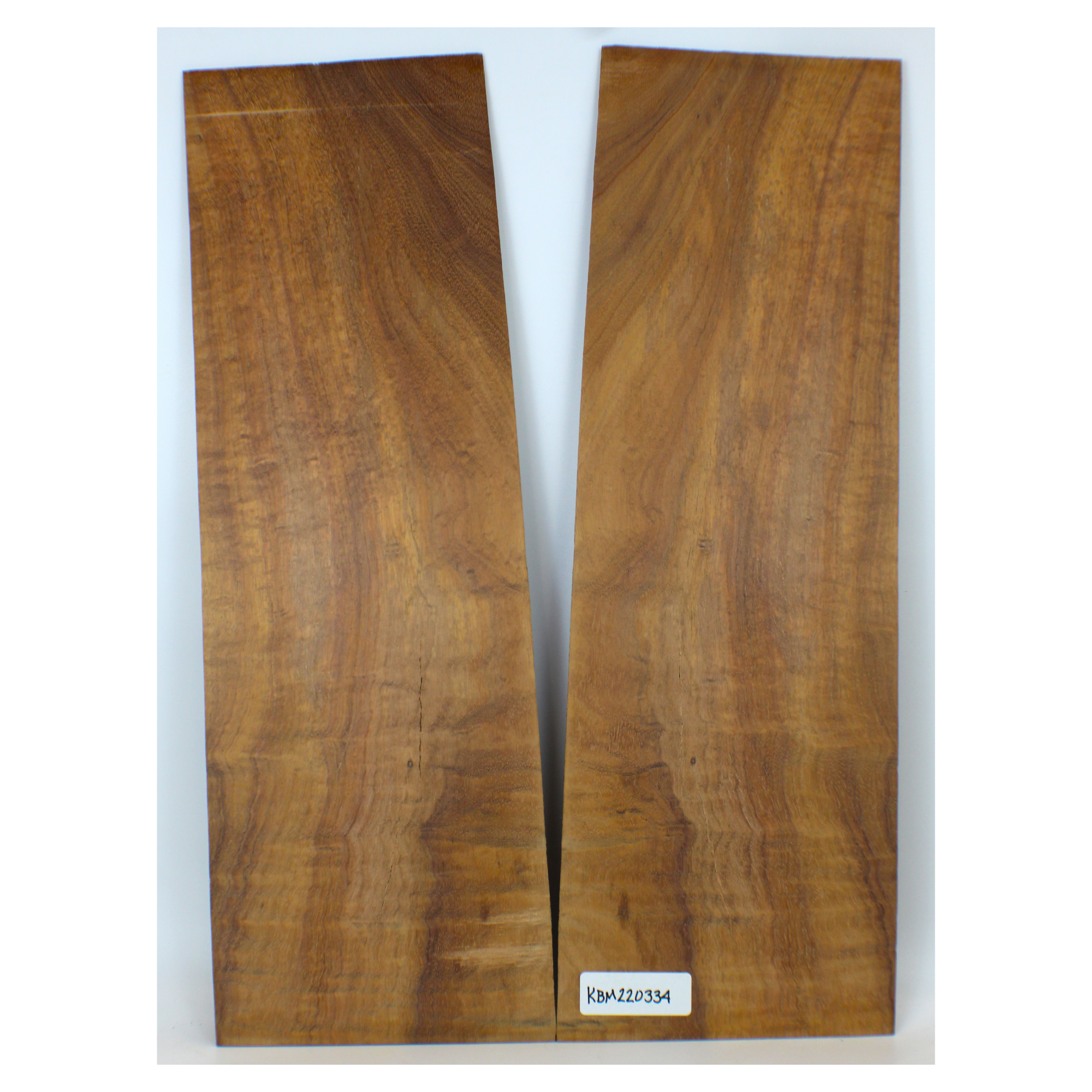 2-piece curly koa book-matched set with 4A grade, flat sawn curl, beautiful color and grain.  There is soft spot rot in this set.  This set has been sanded to 400 grit.  Dimensions: Thickness (each piece): .125
