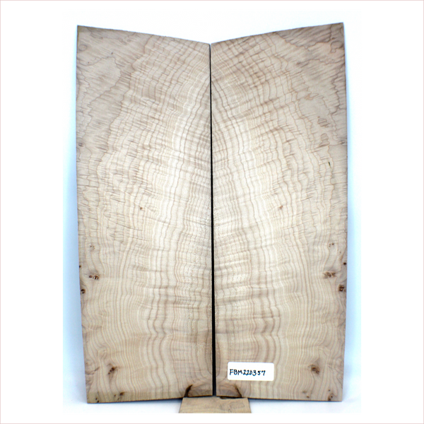 4A grade flame maple book-matched set with slightly off-quartered figure, giving it wavy figure lines and light angel step patterning.  There are tiny burls in this set.  It has been sanded to 400 grit.  Dimensions: Thickness (each piece): .25", Max width: 8", Length: 22.75.