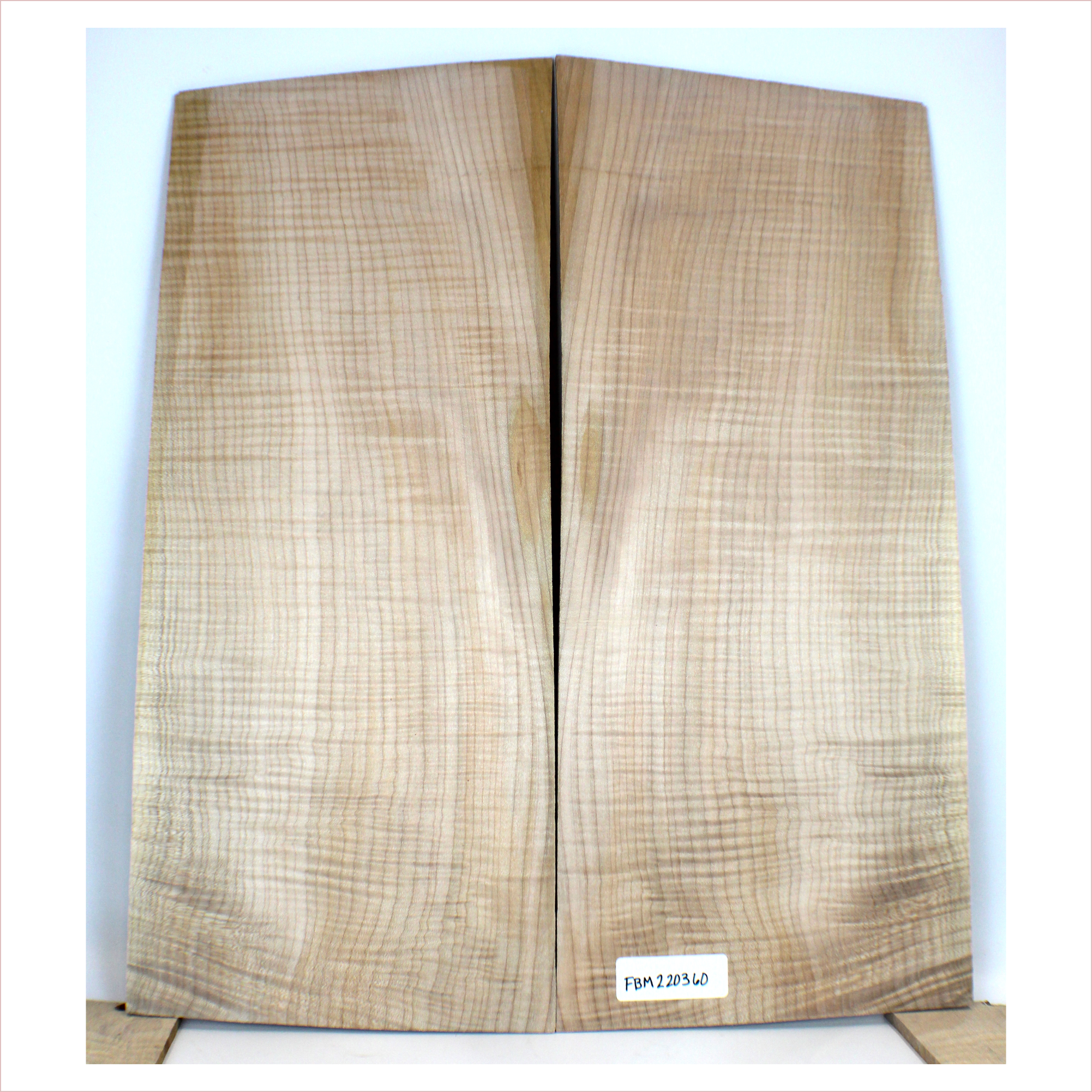Music grade 3A flame maple set with well-quartered light figure throughout and no defect.  This set has been sanded to 400 grit.  Dimensions: Thickness (each piece): .25