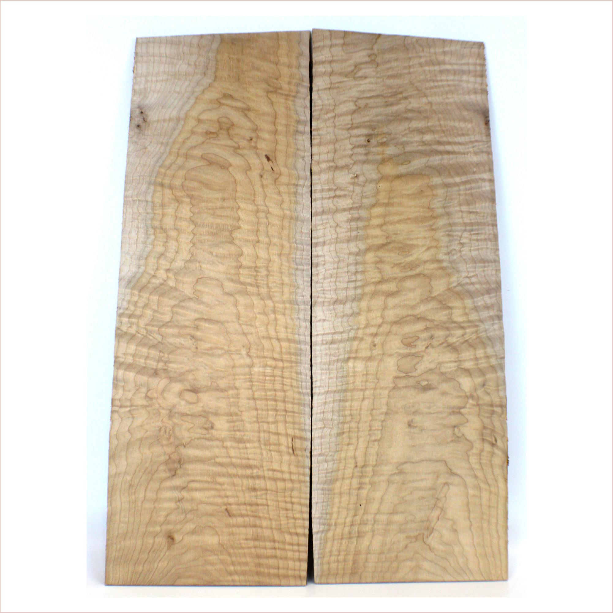 Beautiful 5A grade flat-sawn flame figure with dramatic dark cambium inclusions and two-tone color.  This set has been sanded to 400 grit.  Dimensions: Thickness (each piece): .25