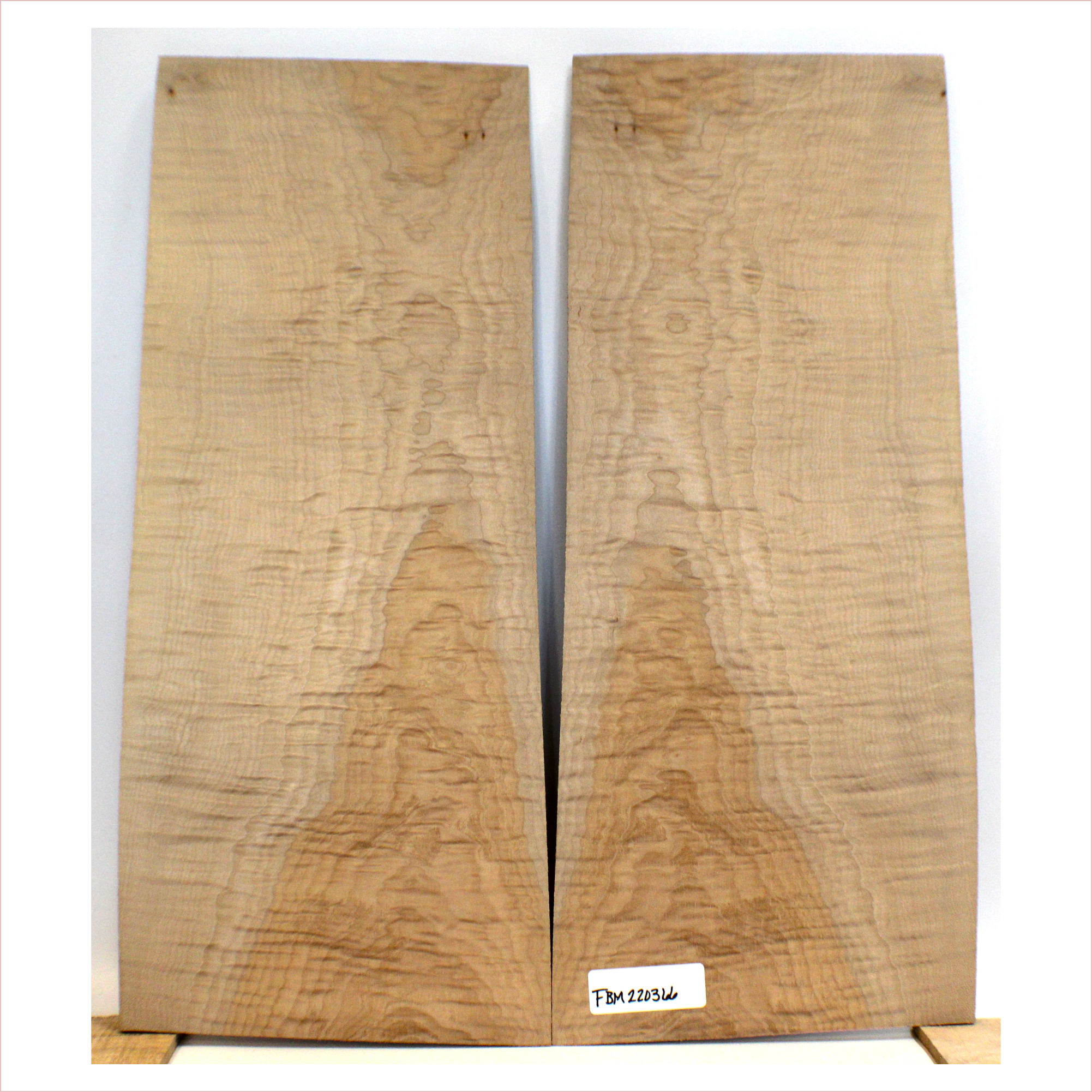 Two-tone, flat-sawn flame maple set with 5A figure and no defect.  This set has been sanded to 400 grit.  Dimensions: Thickness (each piece): .25