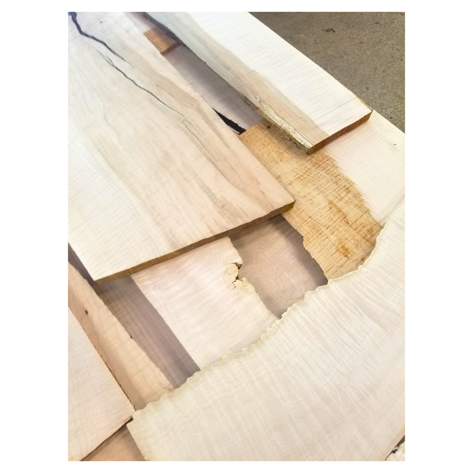 Examples of high figure maple mill ends.  Several pieces in varying lengths, widths, and colors.