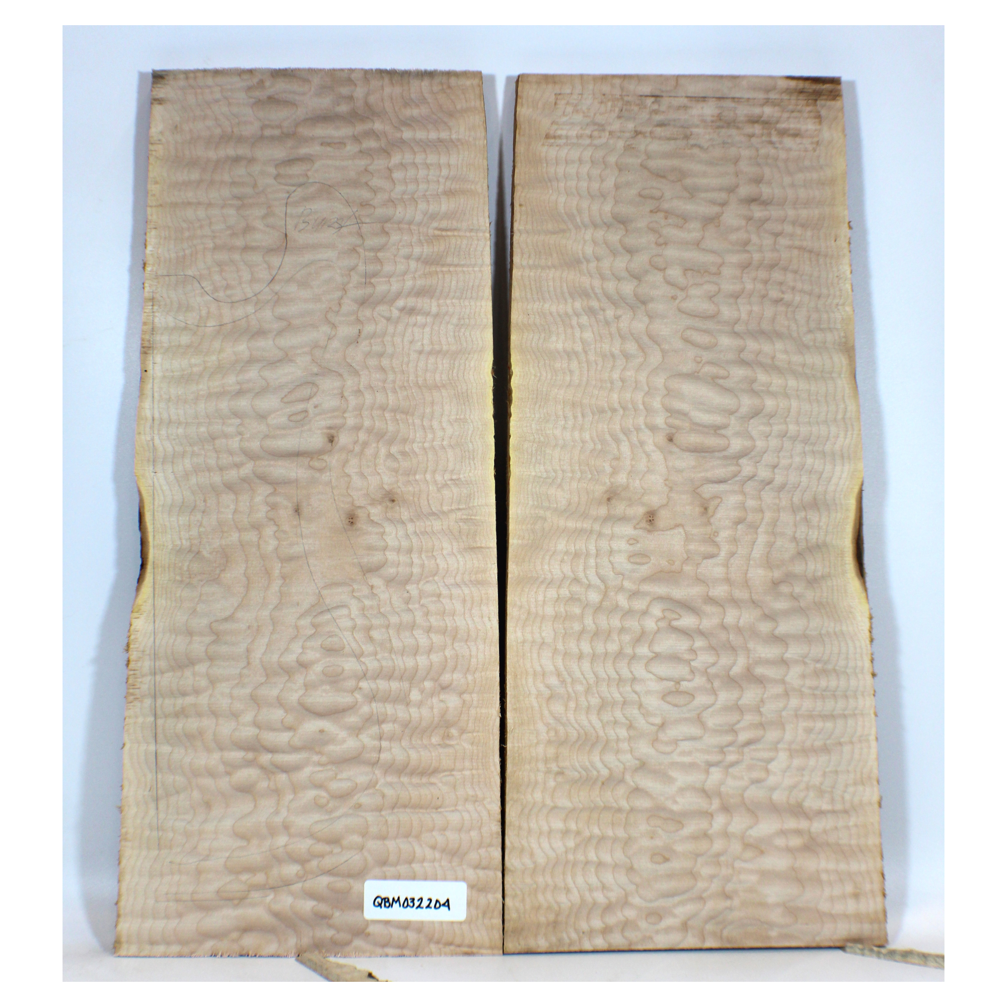 Beautiful quilted maple book-matched set with 4A grade figure, no color or stain, and tiny burls in the center.  Dimensions: Thickness (each piece): .75, Width: 10