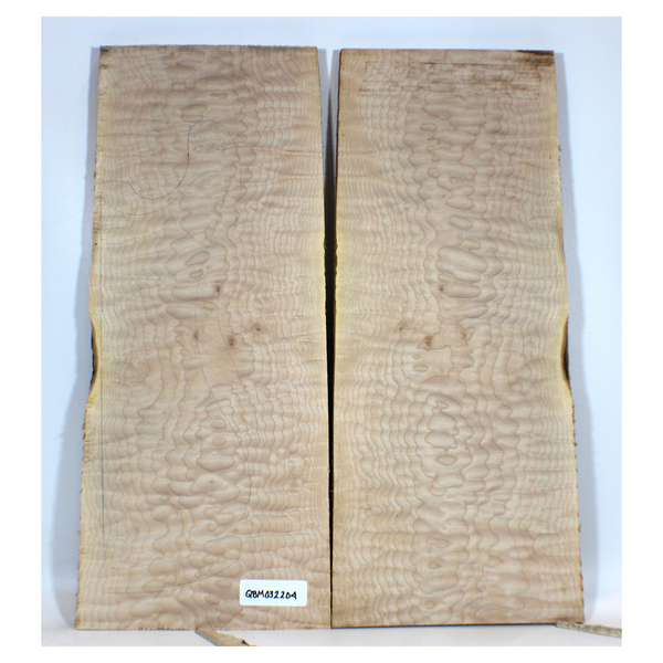 Beautiful quilted maple book-matched set with 4A grade figure, no color or stain, and tiny burls in the center.  Dimensions: Thickness (each piece): .75, Width: 10", Length: 23".