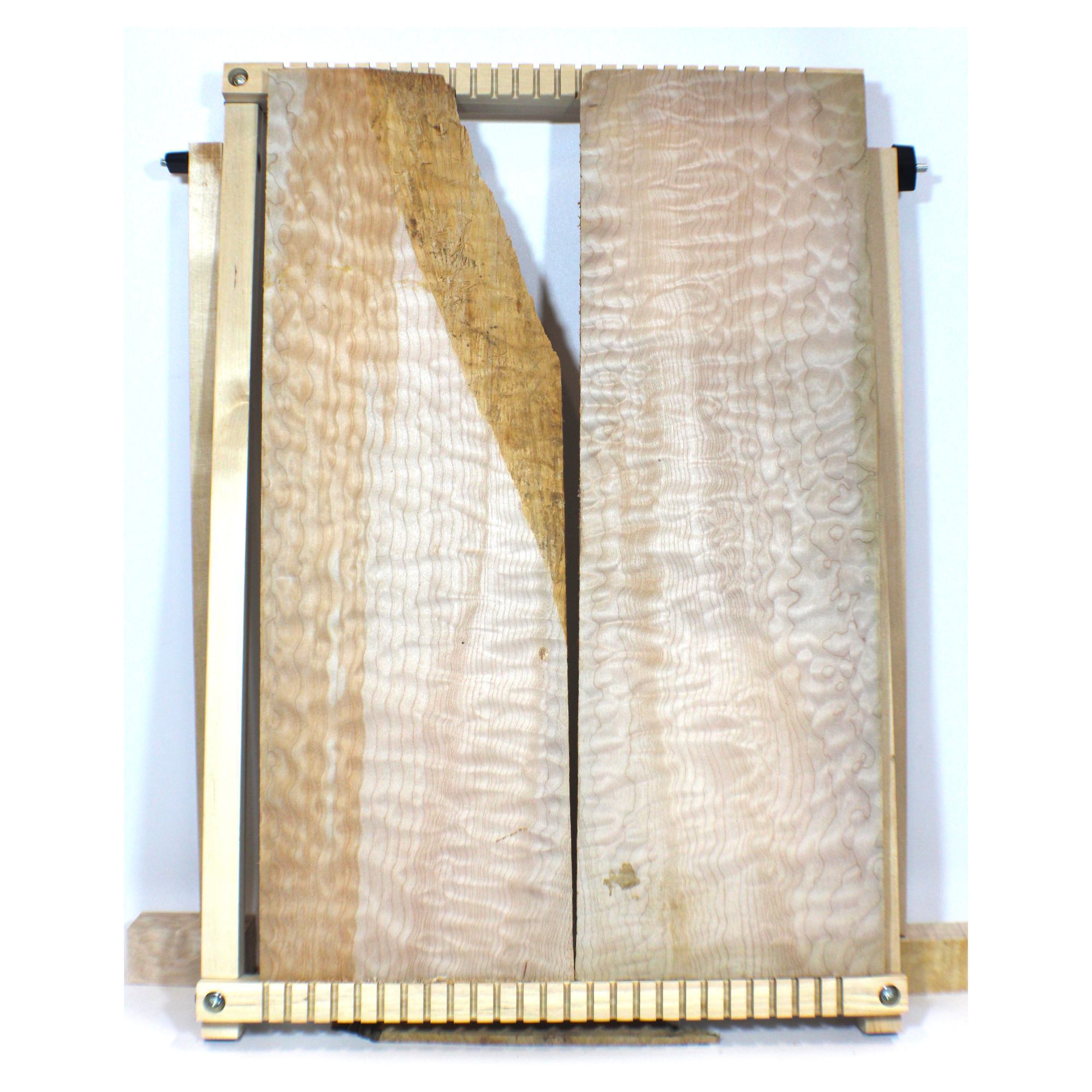 Striking, beautiful quilted maple book match with 4A blister figure, light blue streak, and two-tone color.  One piece has a wain on the edge.  Dimensions: Thickness (each piece): .5, Width: 7.5