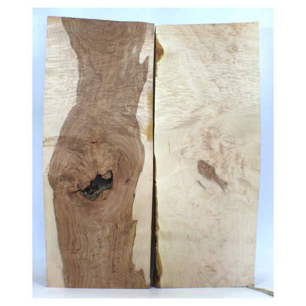 Beautiful quilted maple book-matched set with striking two-tone color, void, and high grade quilting.  Dimensions: Thickness each piece: 1.25", Max width: 11", Length: 27.5"