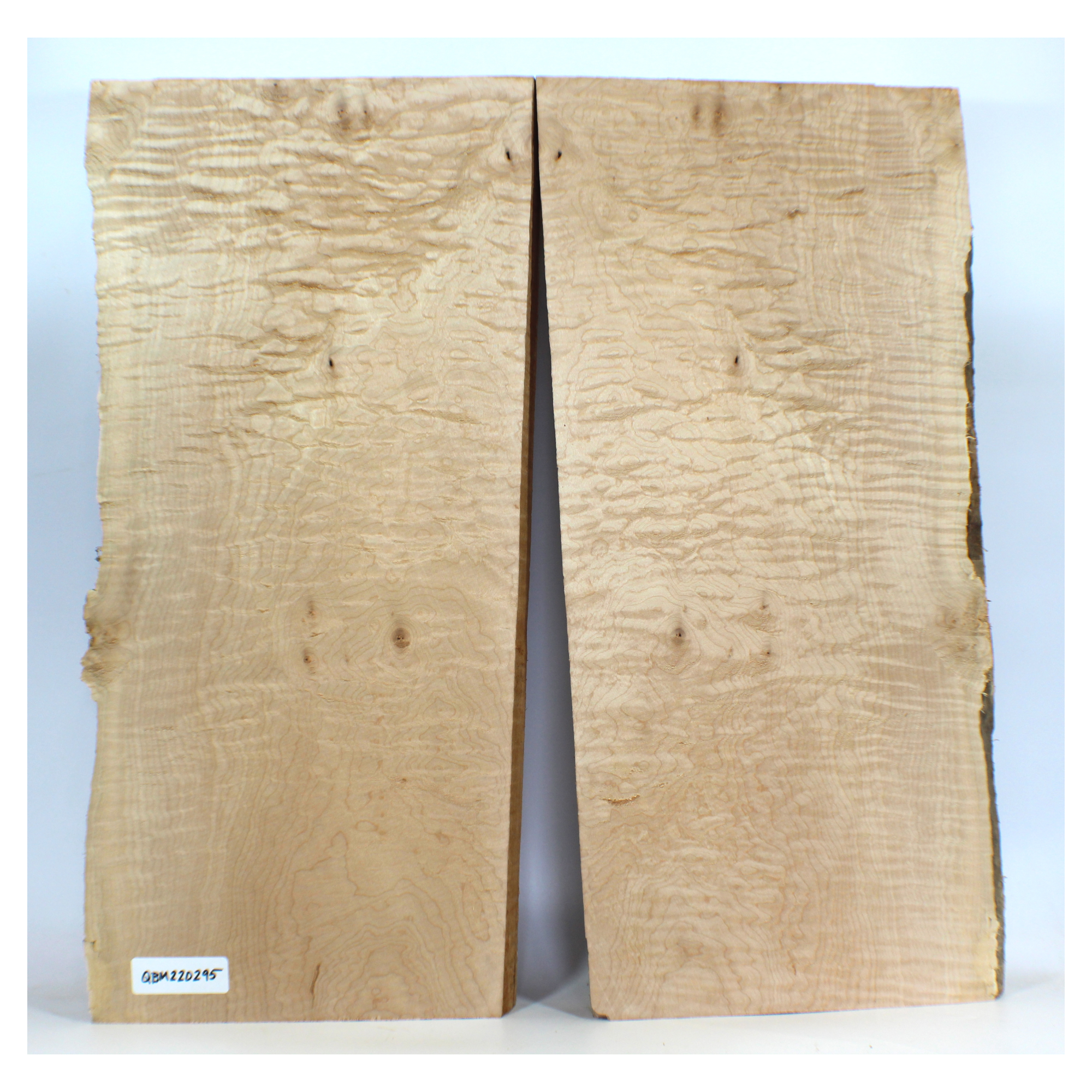 Interesting quilted maple 2-piece set with high grade figure and scattered burls and bird pecks throughout.  Dimensions: Thickness each piece: 1.25
