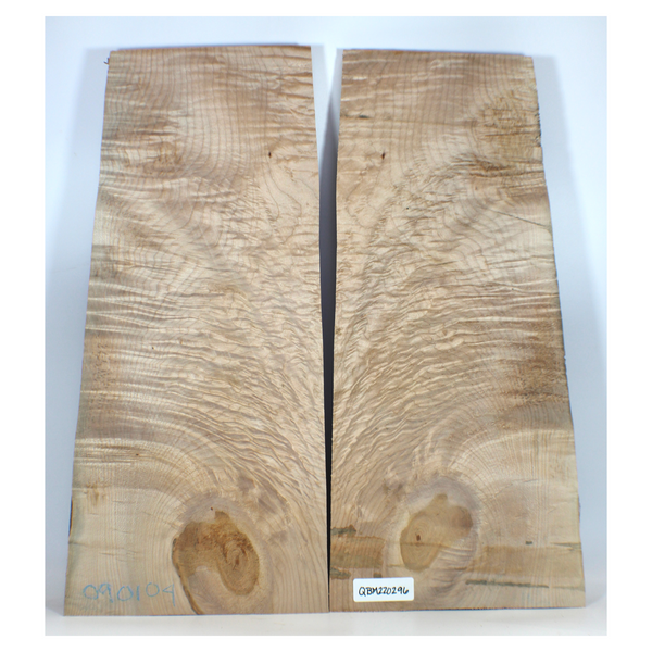 Beautiful quilted maple book-matched set with a really interesting knot, offset by intense angel step curling.  Dimensions: Thickness each piece: 1", Max width: 10.25", Length: 24.25"
