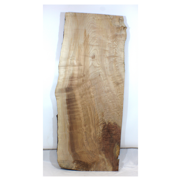 Quilted maple table slab with nice figure, beautiful color streak, and live edge. Dimensions: Thickness: 1.25", Max width: 19.25", Length: 44.75.