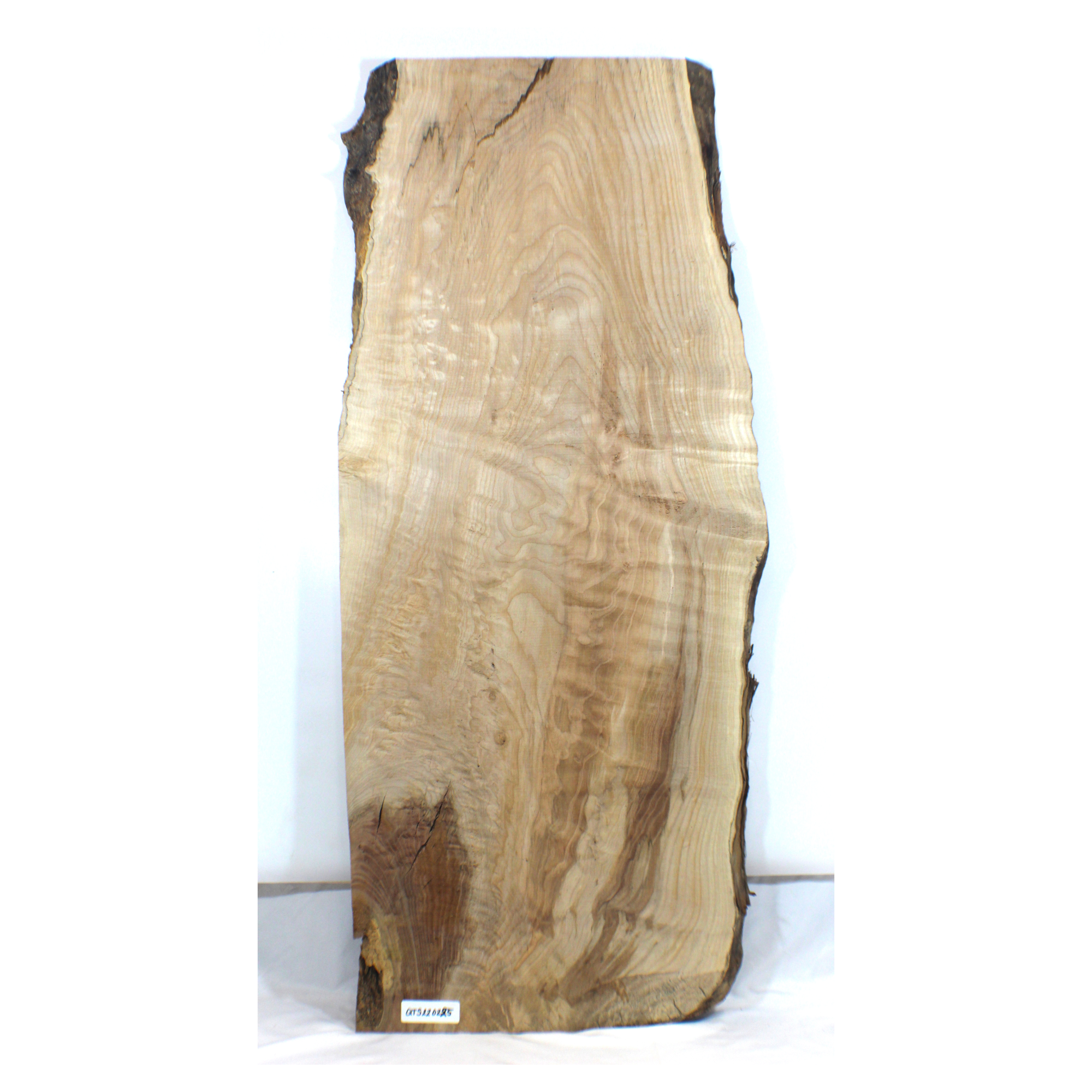 Quilted maple table slab with nice figure, beautiful color streak, and live edge. Dimensions: Thickness: 1.25
